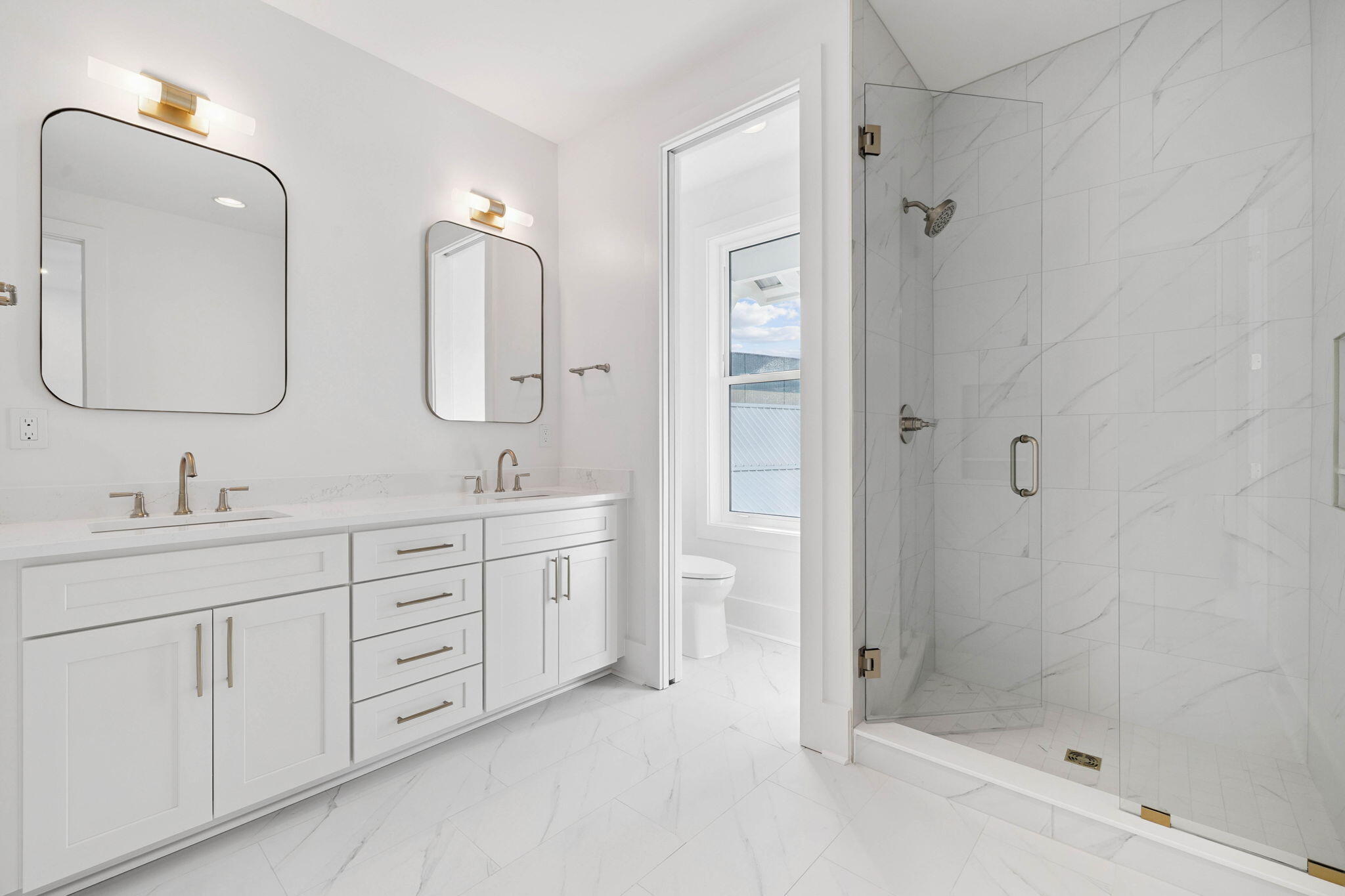 264 Dockside Drive Port St. Joe, FL 32456 - Photo 32 of 65 a bathroom with double sink and a mirror