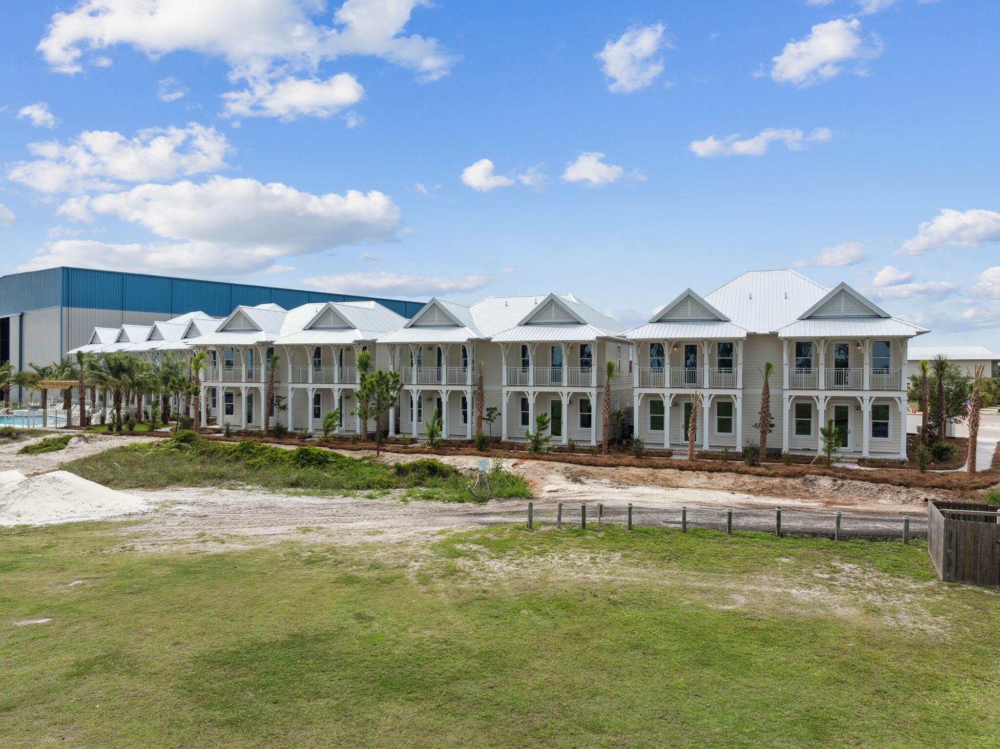 264 Dockside Drive Port St. Joe, FL 32456 - Photo 42 of 65 a front view of a house with swimming pool and yard