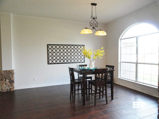 27927 Rileywood Drive Daphne, AL 36526 - Photo 9 of 24 Formal Dining Room with Arched Window and Columns with Stacked Stone