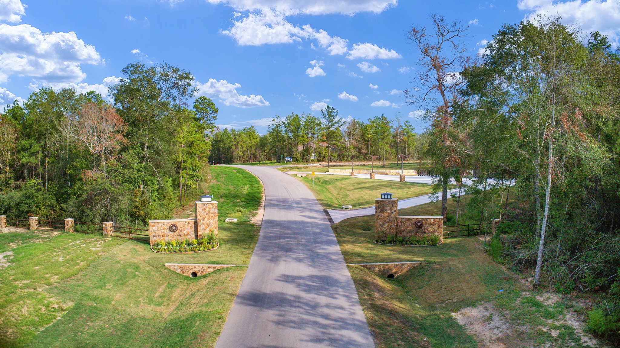 10886 Ruger Road Willis, TX 77378 - Photo 3 of 25 a view of a lake with a garden