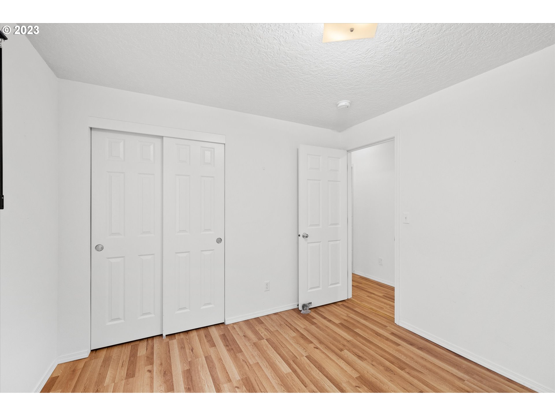 37308 Rachael Drive Sandy, OR 97055 - Photo 17 of 29 a view of an empty room and wooden floor