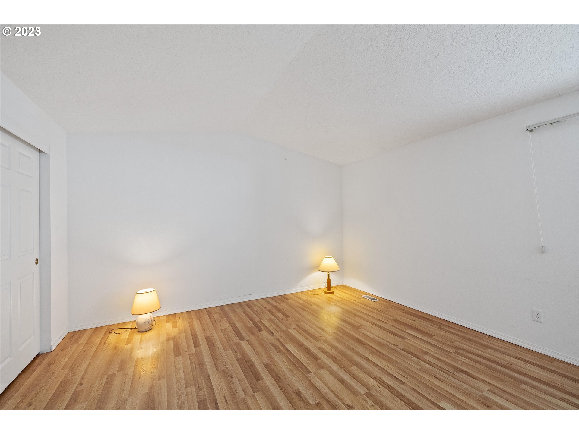 37308 Rachael Drive Sandy, OR 97055 - Photo 20 of 29 a view of an empty room and wooden floor