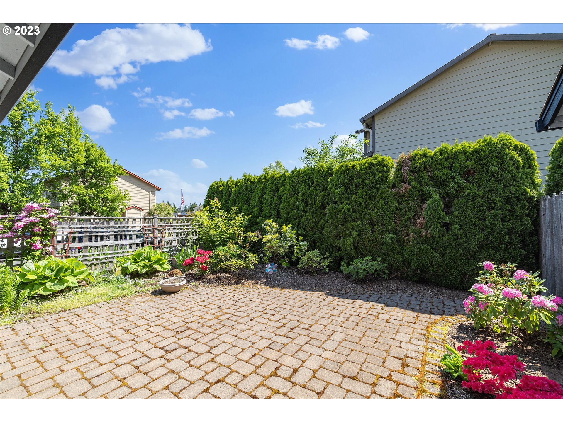 37308 Rachael Drive Sandy, OR 97055 - Photo 4 of 29 a view of a garden with flowers