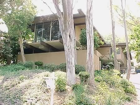4269 Miramonte Place Riverside, CA 92501 - Photo 1 of 1 a front view of a house with garden