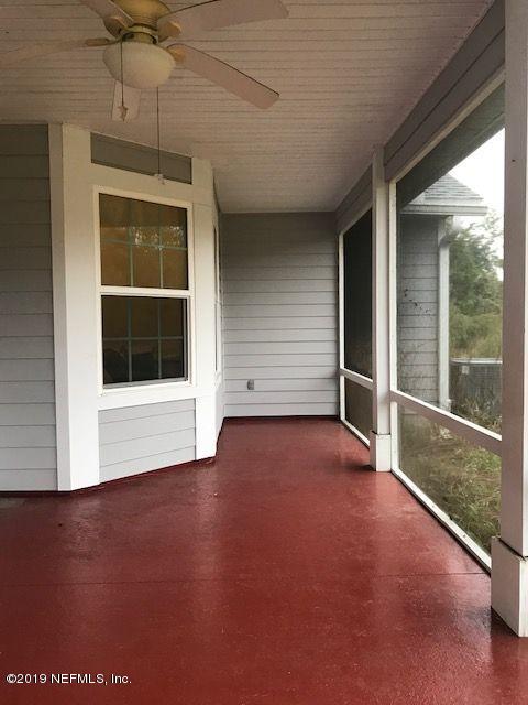 56205 Davis Road Callahan, FL 32011 - Photo 21 of 26 Davis screened back porch