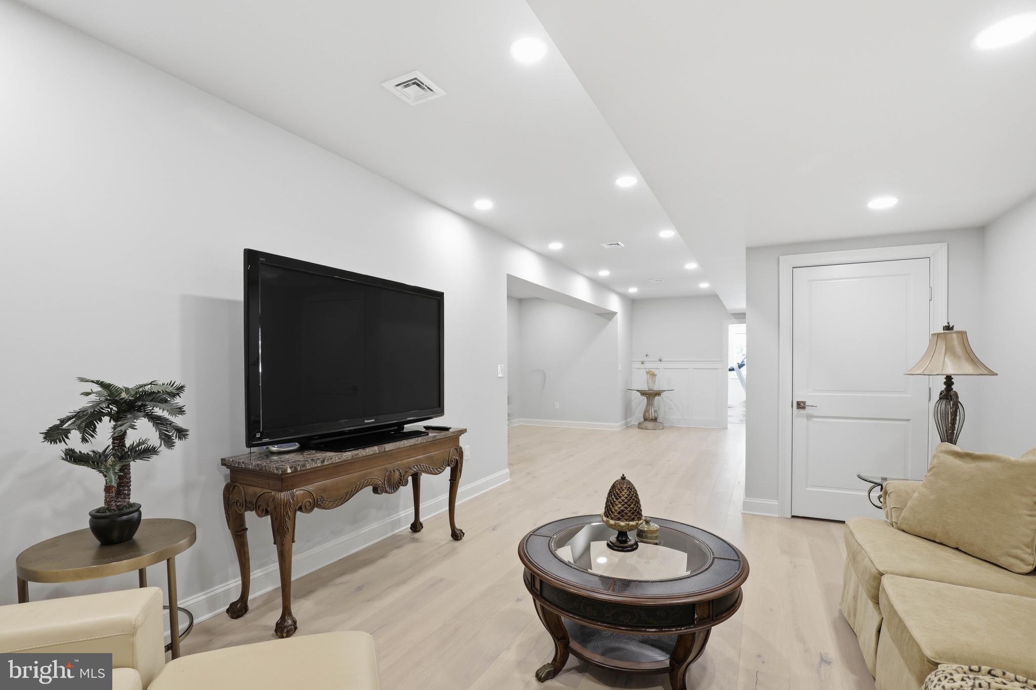 360 Addison Place Lancaster, PA 17601 - Photo 63 of 78 a living room with furniture and a flat screen tv