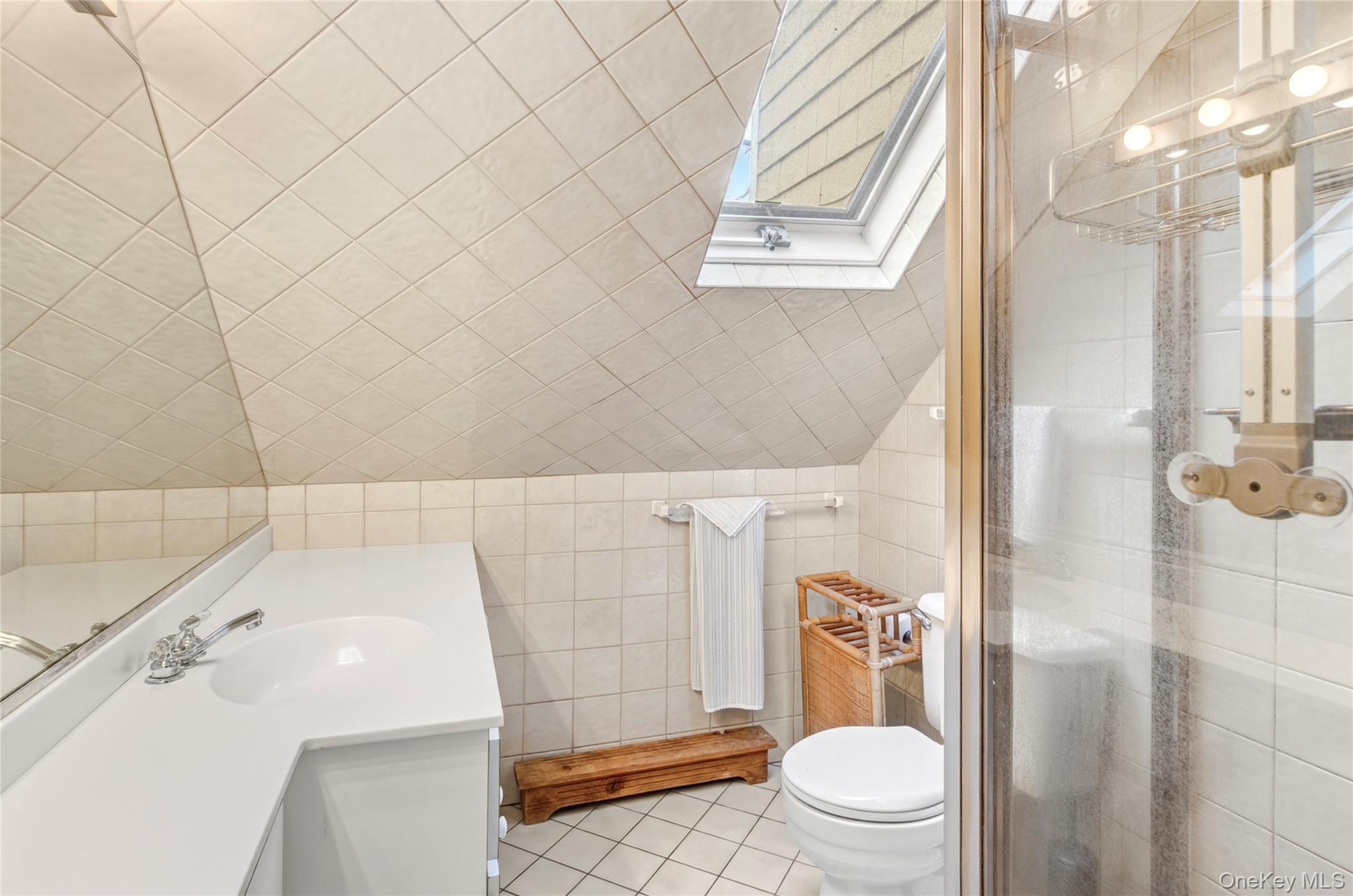 750 Reeve Avenue Mattituck, NY 11952 - Photo 40 of 41 a bathroom with a sink and toilet