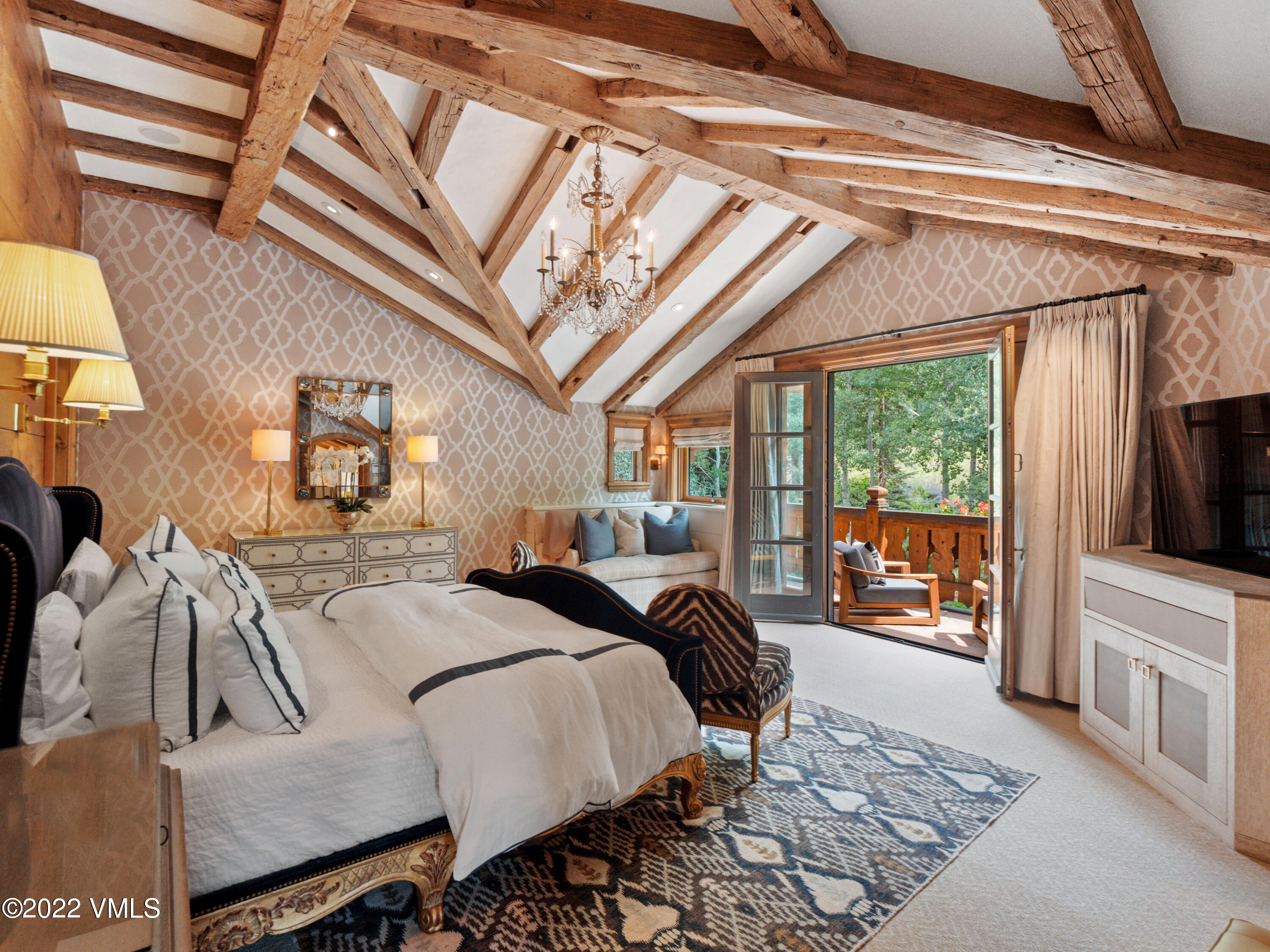 97 Rockledge Road Vail, CO 81657 - Photo 13 of 35 a bed room with a bed and a television