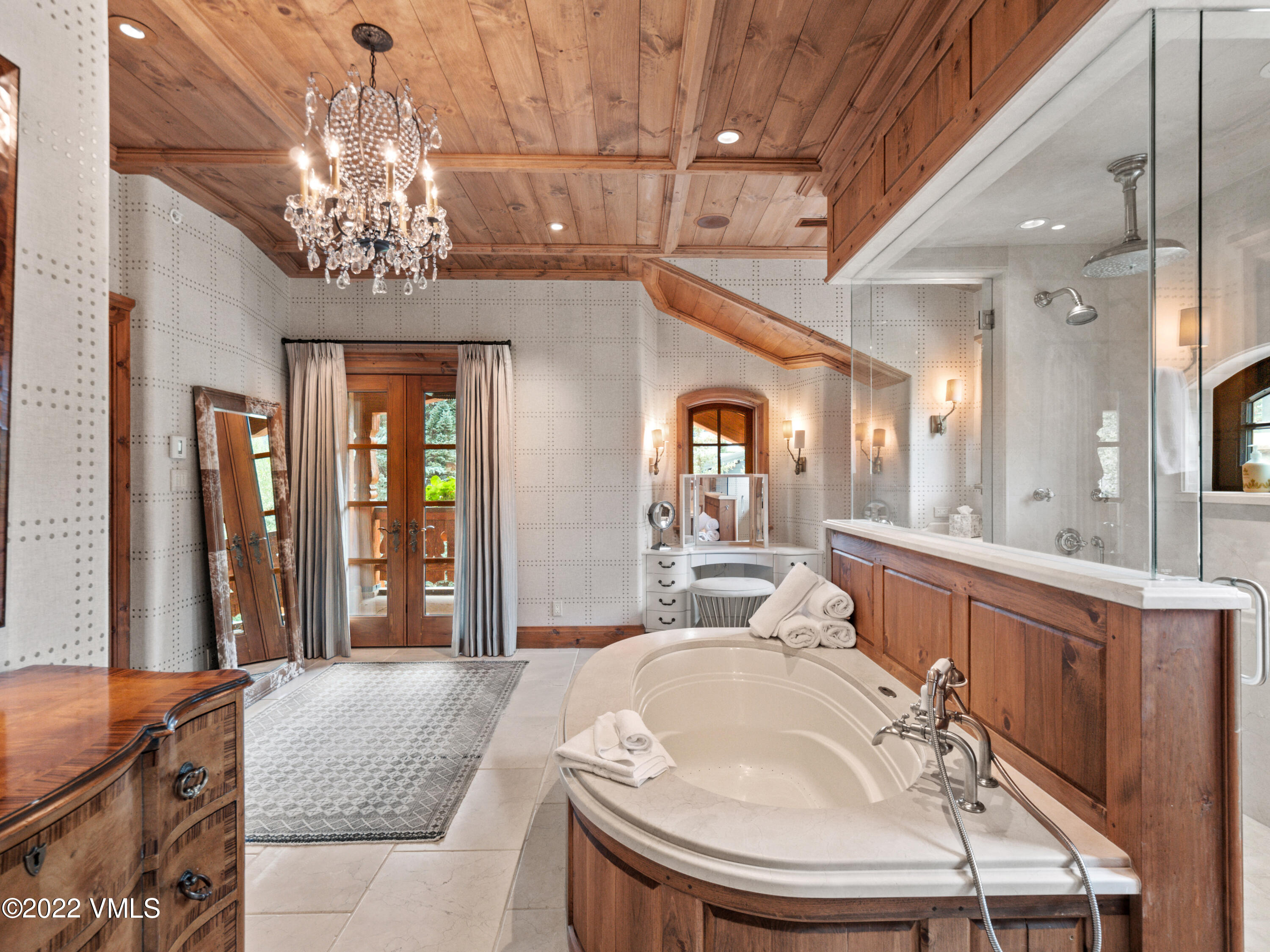 97 Rockledge Road Vail, CO 81657 - Photo 14 of 35 a living room with a chandelier furniture and a chandelier