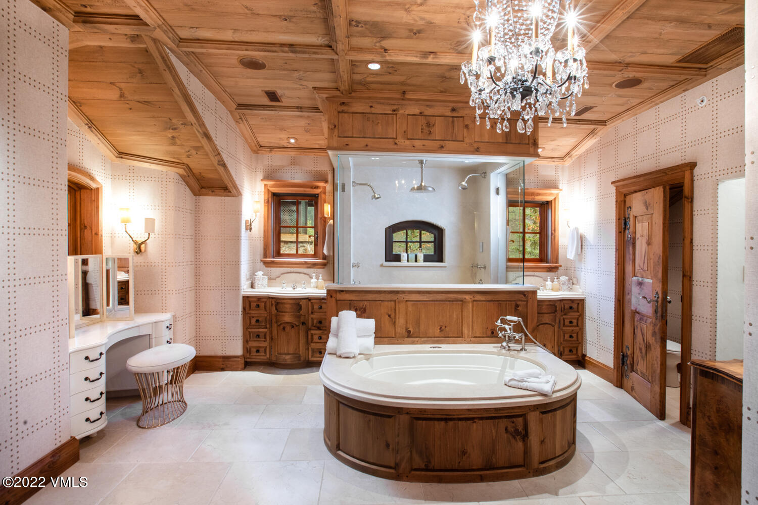 97 Rockledge Road Vail, CO 81657 - Photo 15 of 35 a living room with furniture and a chandelier