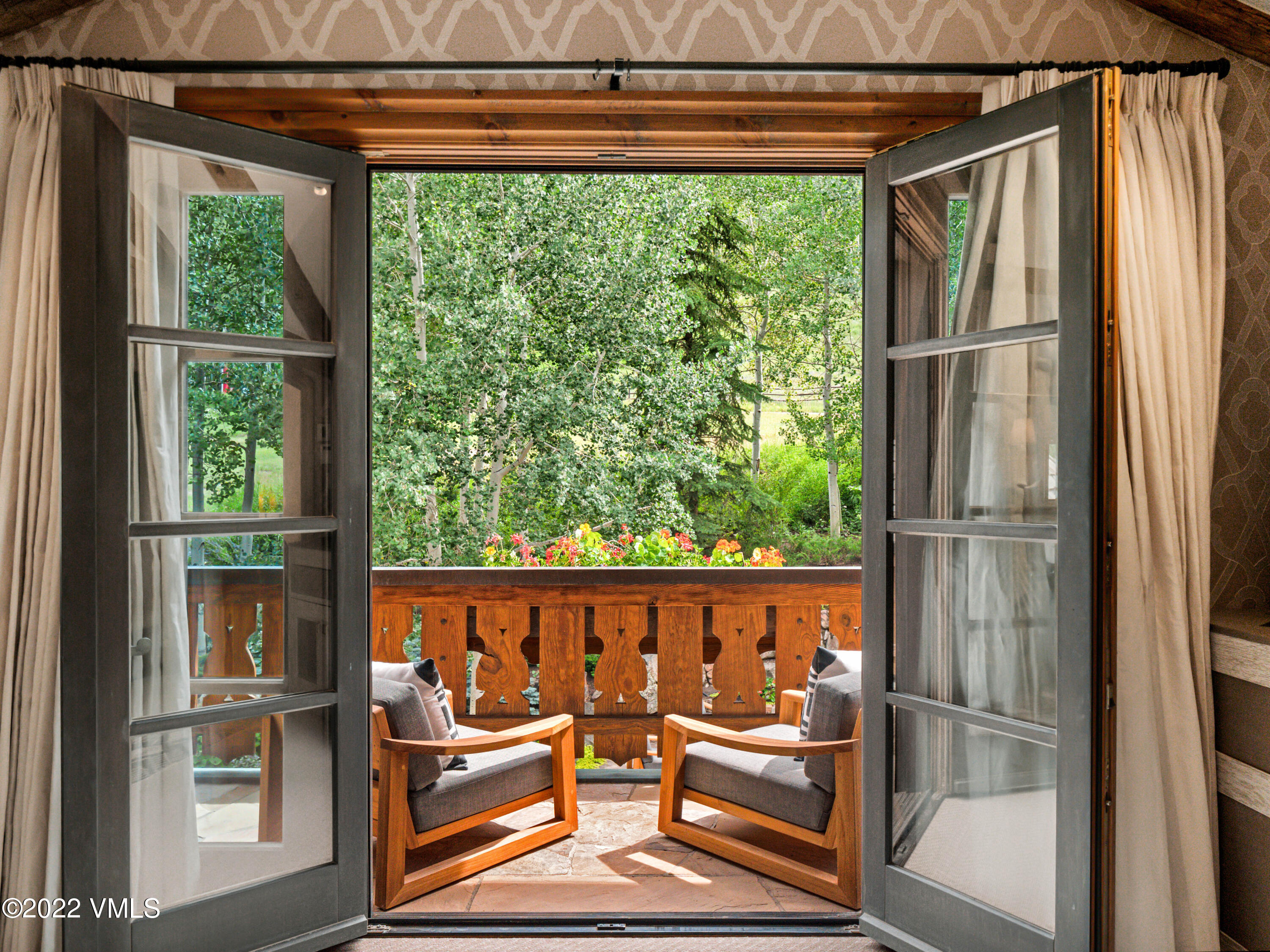 97 Rockledge Road Vail, CO 81657 - Photo 16 of 35 a room with wooden floor and furniture