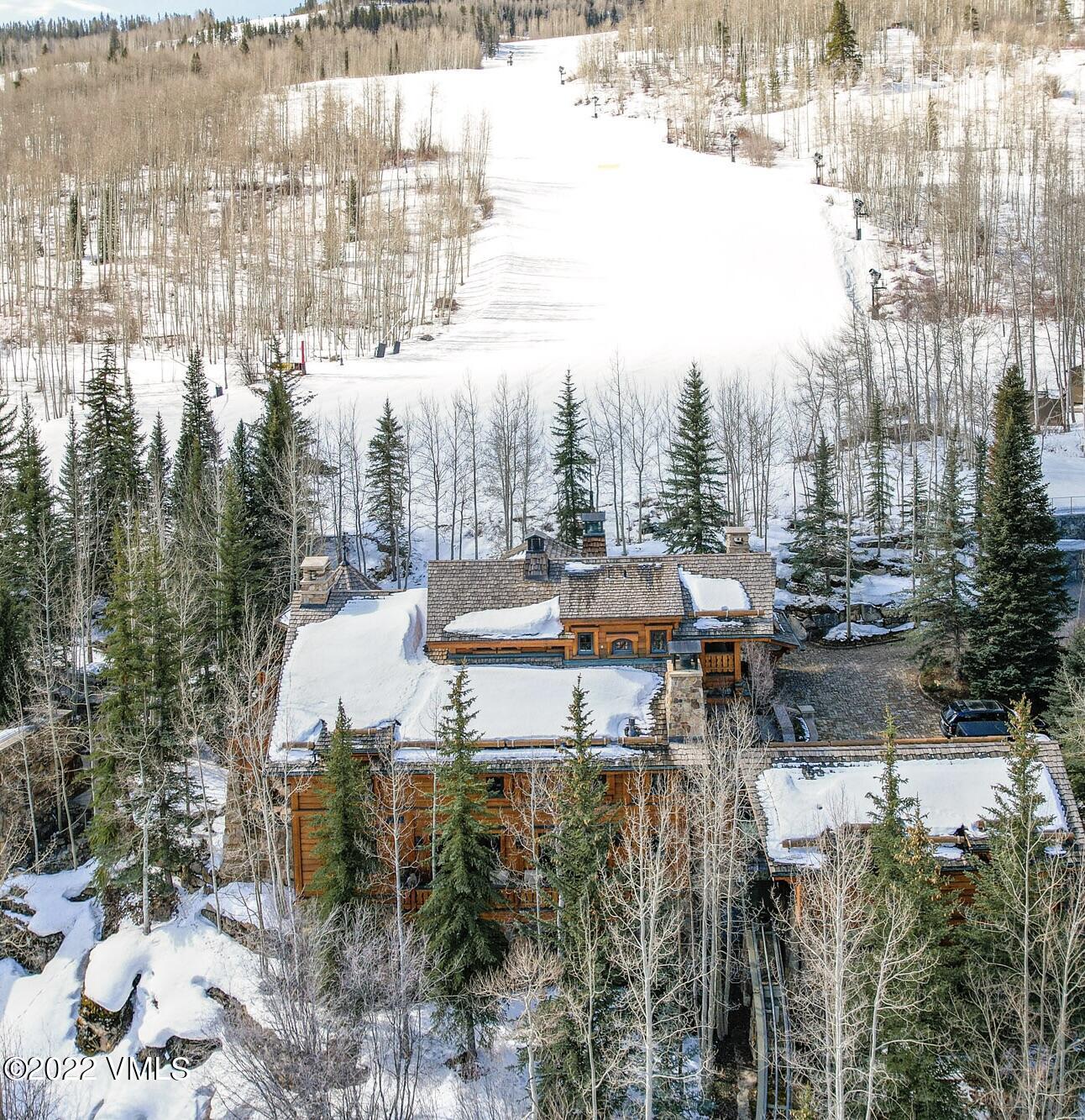 97 Rockledge Road Vail, CO 81657 - Photo 18 of 35 a terrace with outdoor seating and city view