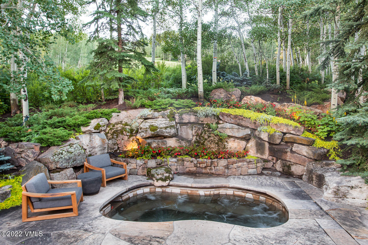 97 Rockledge Road Vail, CO 81657 - Photo 21 of 35 a view of a swimming pool with a patio