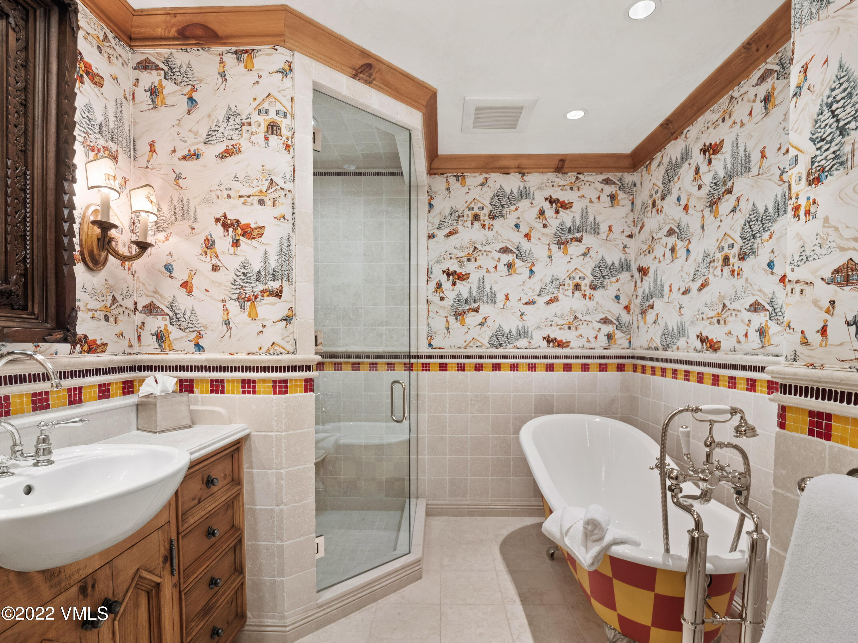 97 Rockledge Road Vail, CO 81657 - Photo 25 of 35 a bathroom with a sink and a mirror