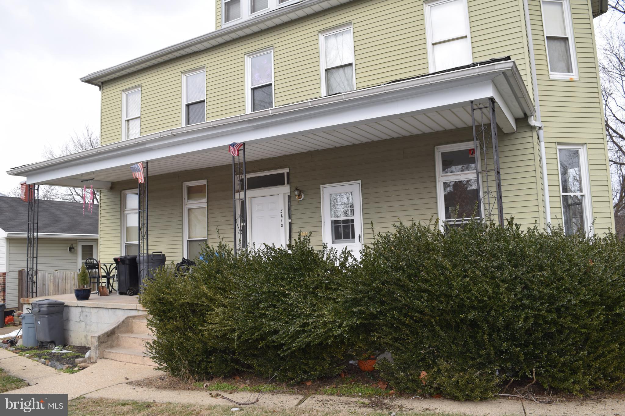 3810 Chesley Avenue Baltimore, MD 21206 - Photo 1 of 14 a front view of a house with garden