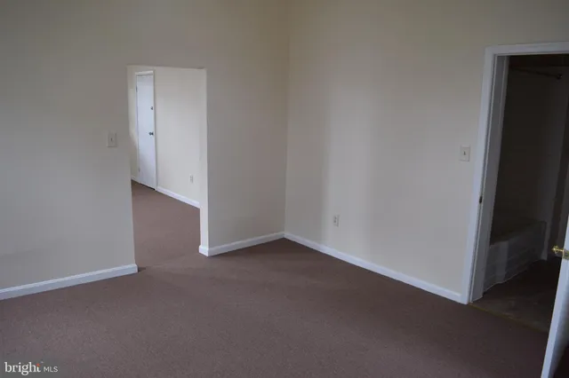an empty room with closet