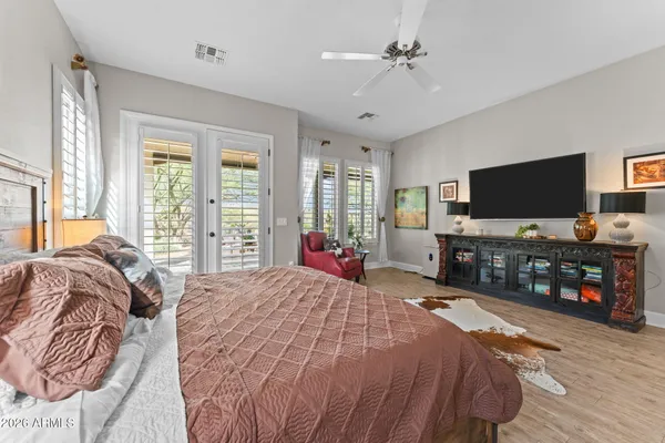 a view of a patio with furniture and a yard