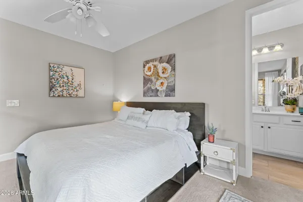 a view of a yard with lawn chairs