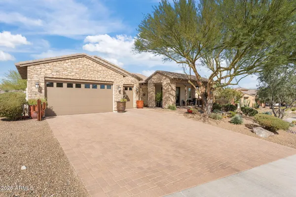 with aerial view of a house with a swimming pool and outdoor seating