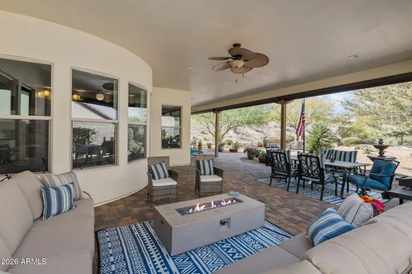 a kitchen with stainless steel appliances kitchen island granite countertop a stove and cabinets