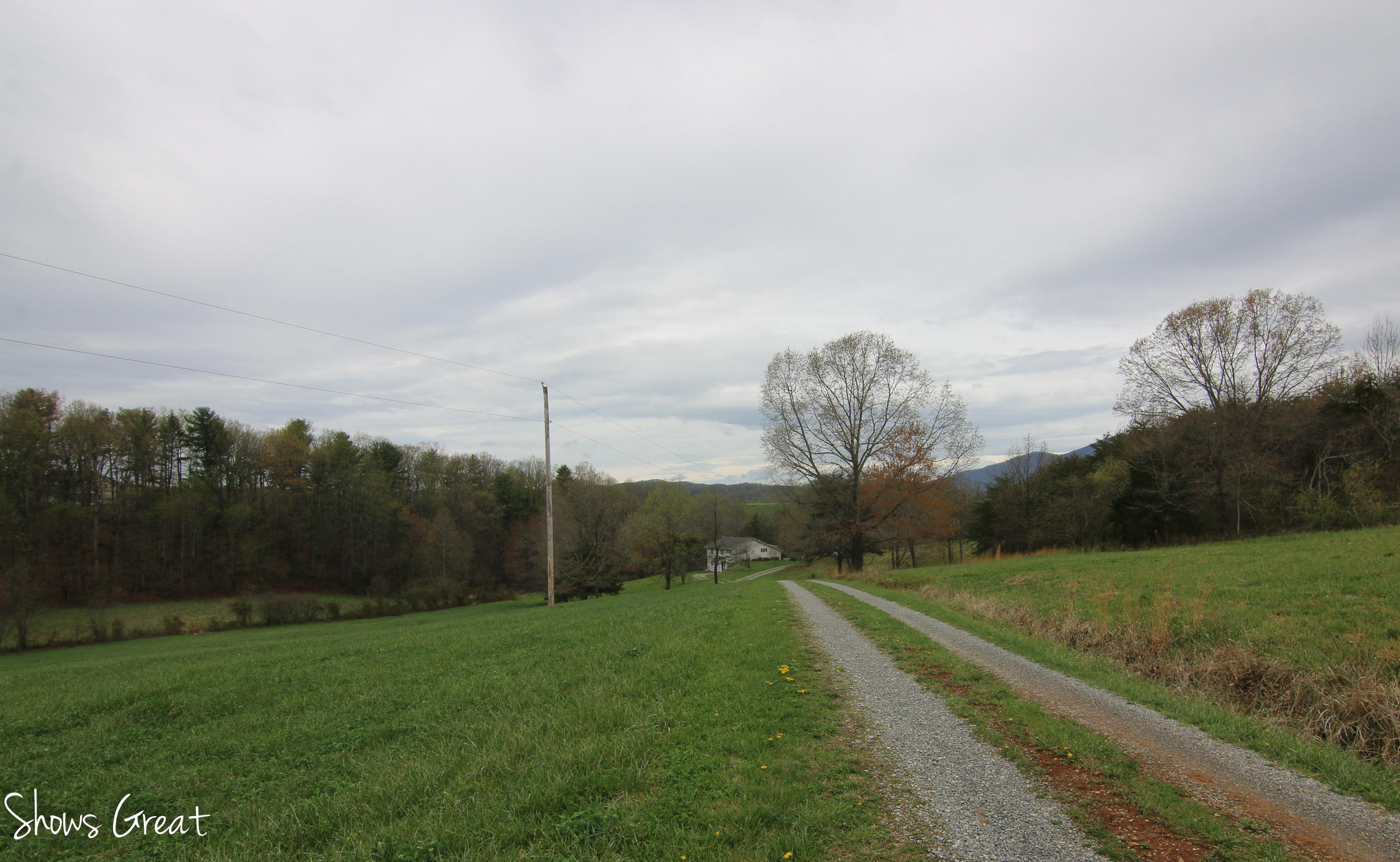 3315 Retreat Road Boones Mill, VA 24065 - Photo 14 of 57 a view of a green field with wooden fence
