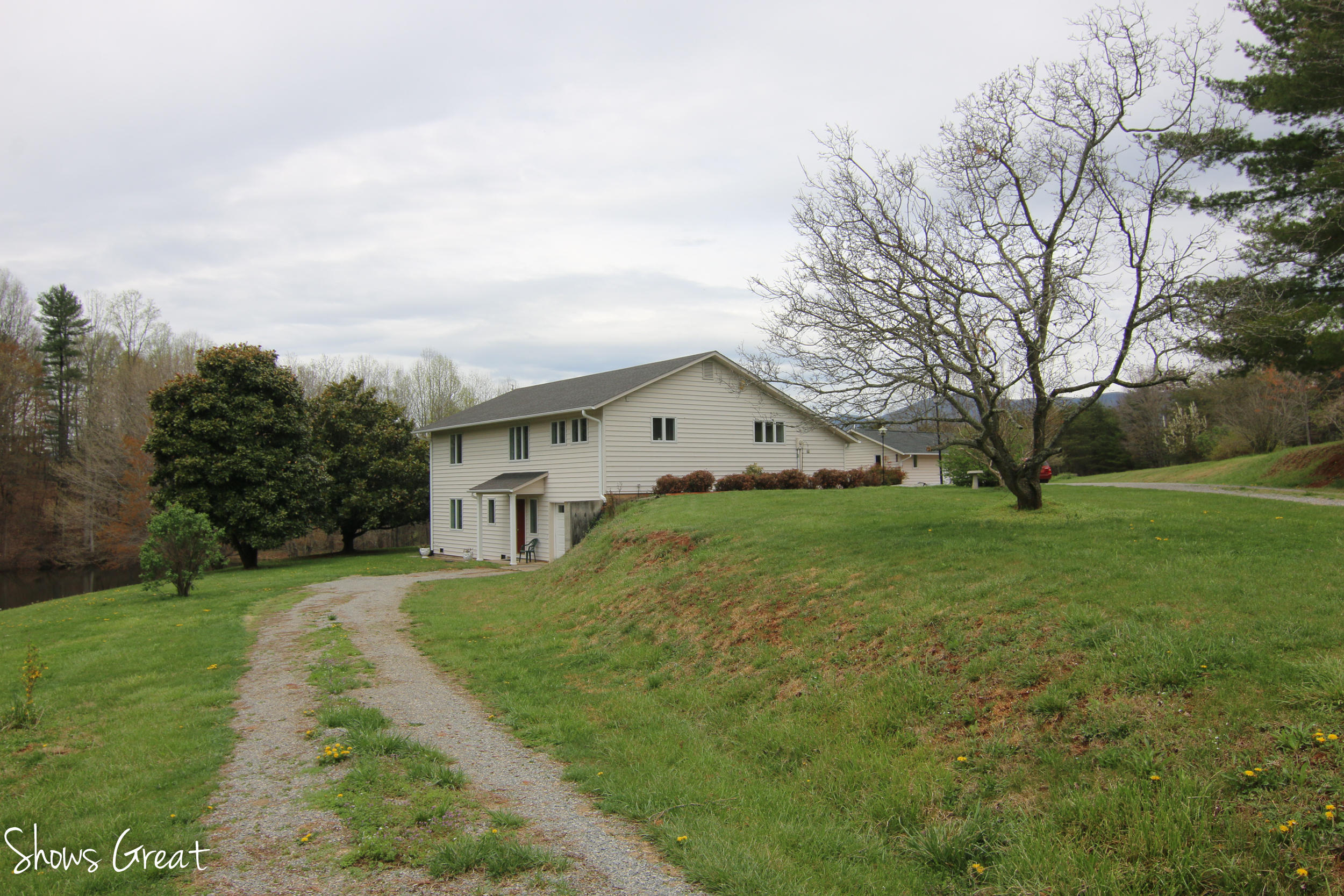 3315 Retreat Road Boones Mill, VA 24065 - Photo 17 of 57 a front view of house with yard and green space