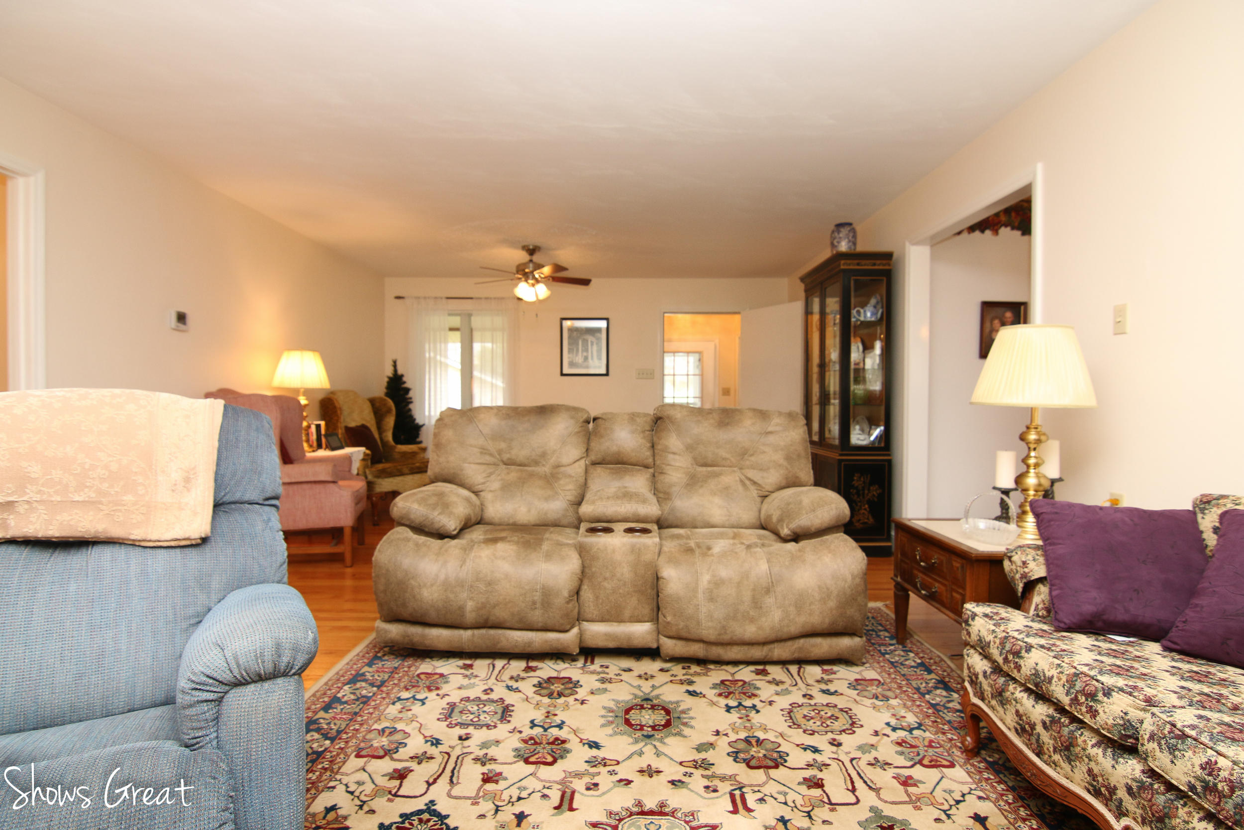3315 Retreat Road Boones Mill, VA 24065 - Photo 34 of 57 a living room with furniture and a lamp