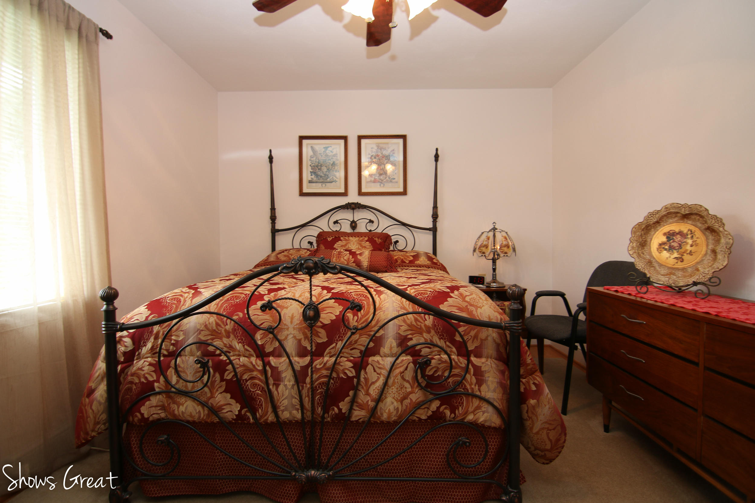 3315 Retreat Road Boones Mill, VA 24065 - Photo 40 of 57 a bedroom with a bed and a chandelier