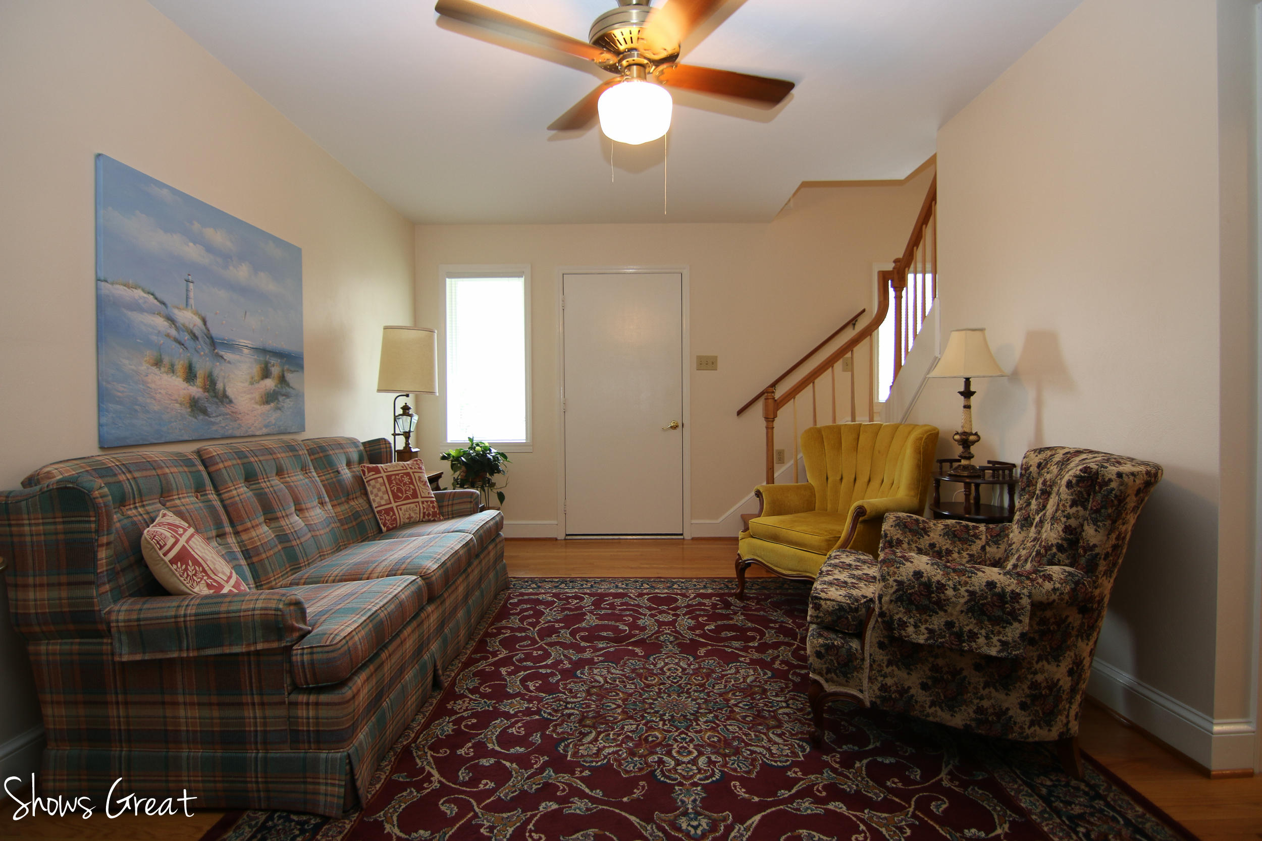 3315 Retreat Road Boones Mill, VA 24065 - Photo 42 of 57 a living room with furniture and a chandelier