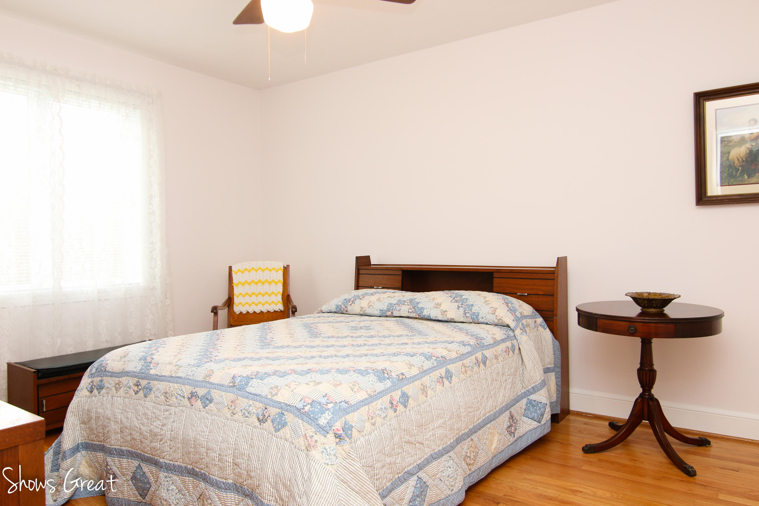 3315 Retreat Road Boones Mill, VA 24065 - Photo 46 of 57 a bedroom with a bed and a chandelier