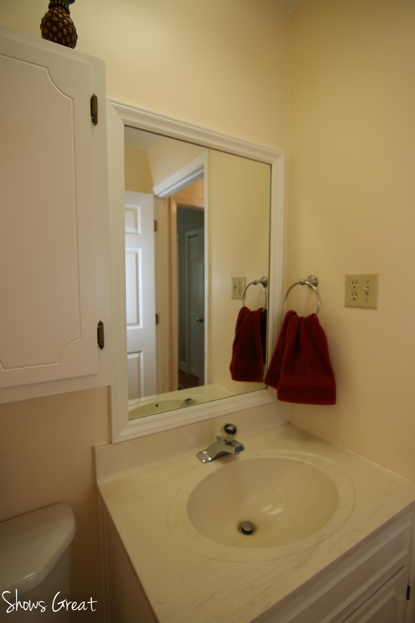 3315 Retreat Road Boones Mill, VA 24065 - Photo 50 of 57 a bathroom with a sink and a mirror