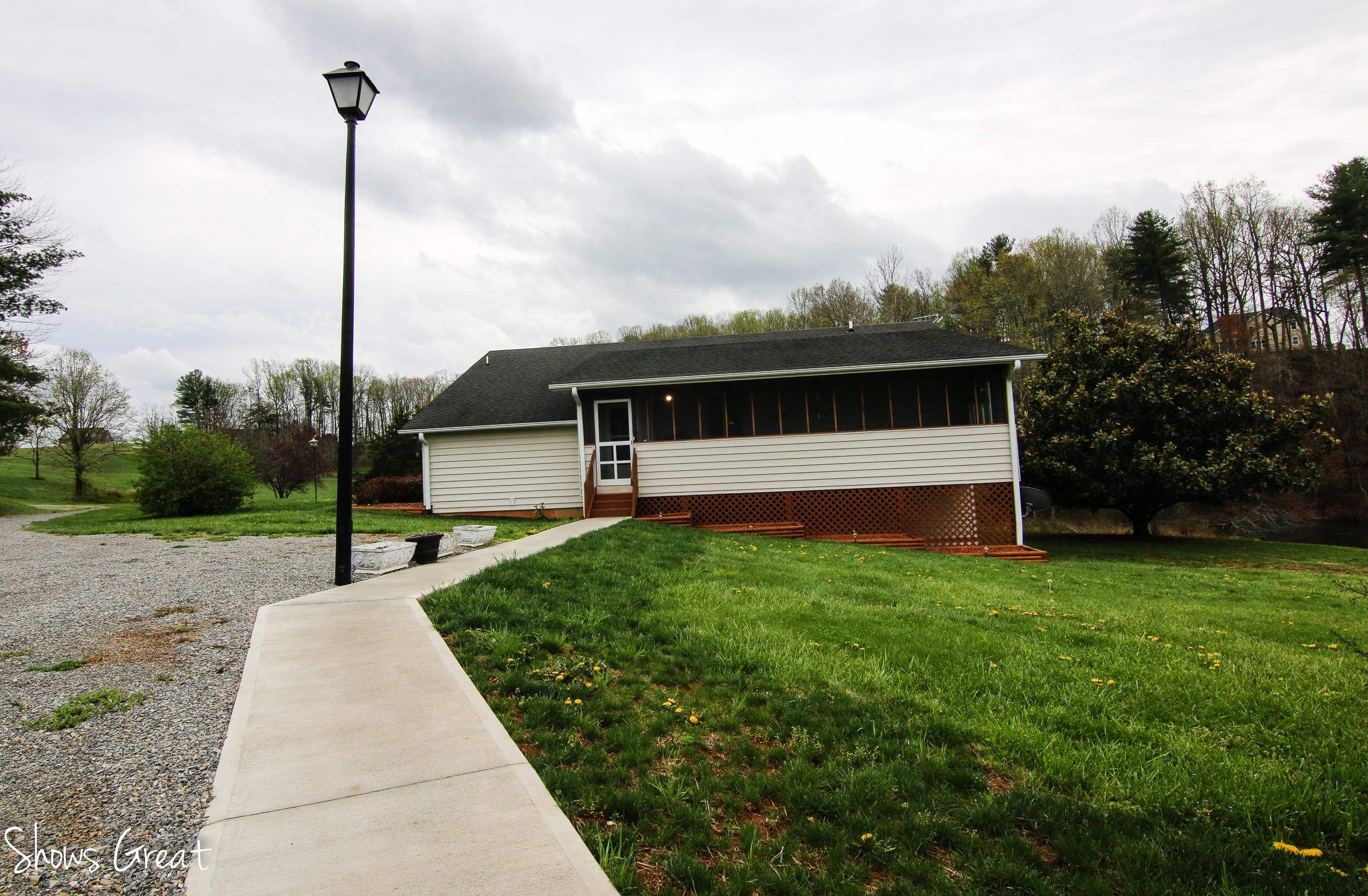 3315 Retreat Road Boones Mill, VA 24065 - Photo 7 of 57 a house view with a garden space