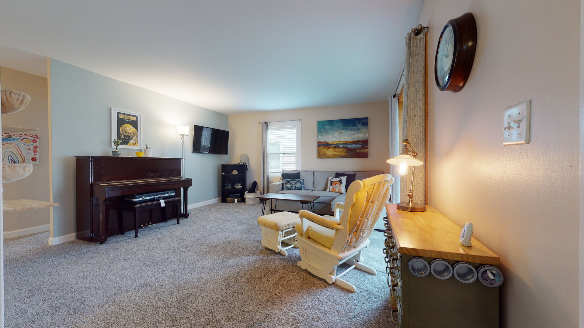 209 Raupp Boulevard Buffalo Grove, IL 60089 - Photo 2 of 13 a living room with furniture and a flat screen tv
