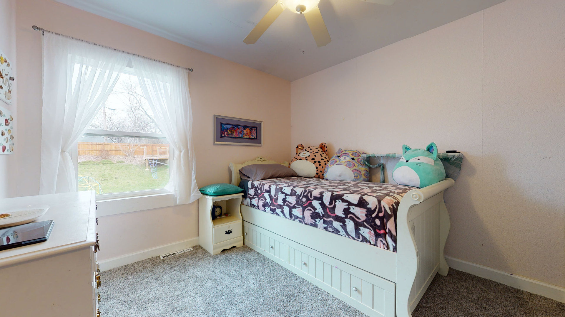209 Raupp Boulevard Buffalo Grove, IL 60089 - Photo 8 of 13 a bedroom with a bed and a window