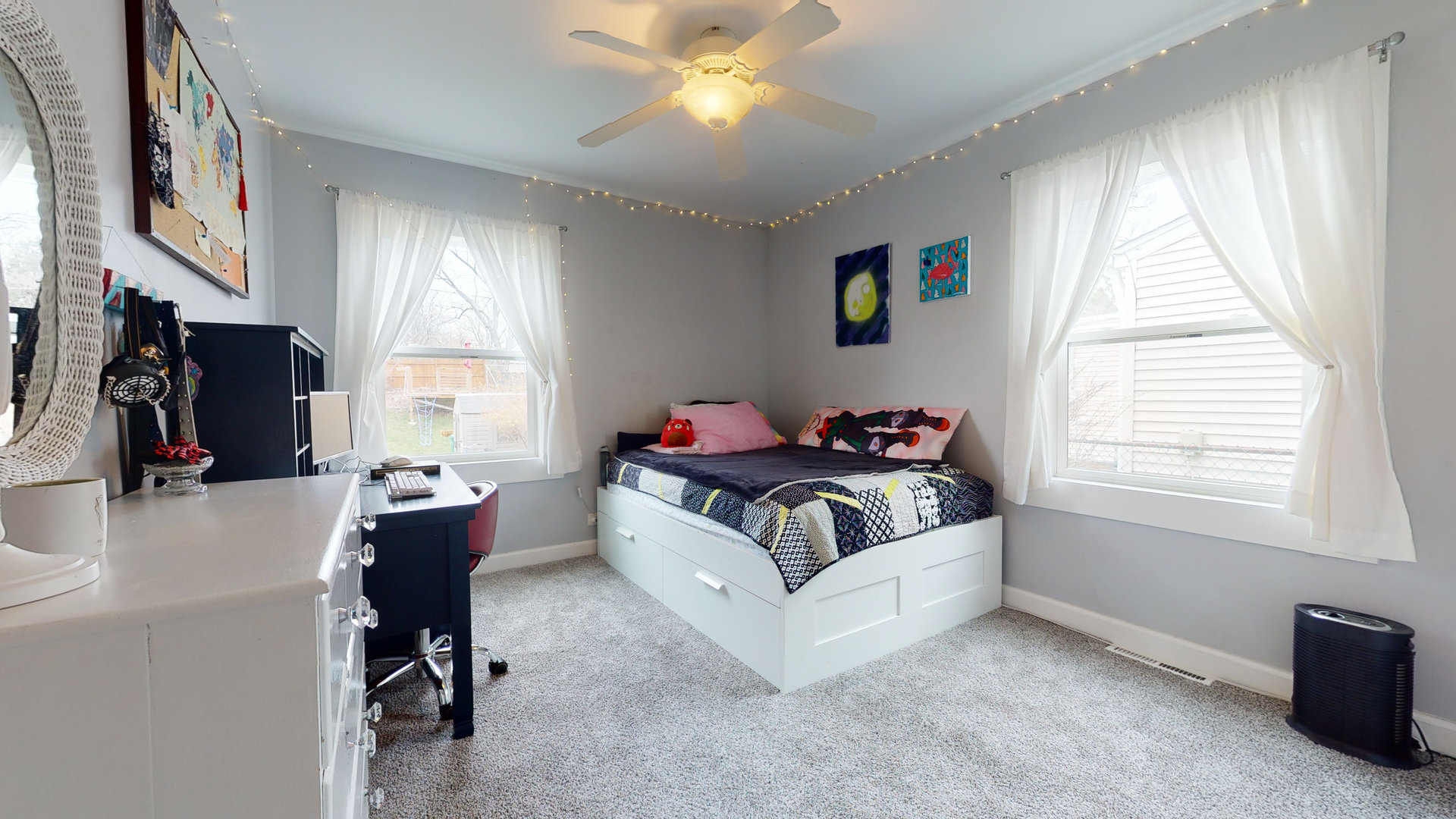 209 Raupp Boulevard Buffalo Grove, IL 60089 - Photo 9 of 13 a white bed sitting in a bedroom next to a window