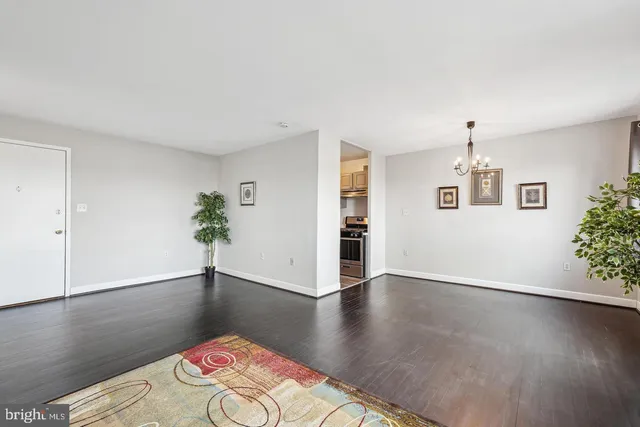 a view of livingroom with hardwood floor and hallway