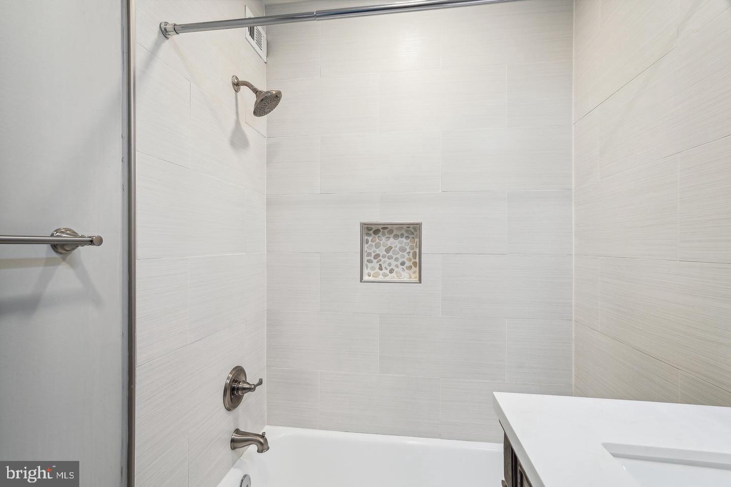 1300 South Arlington Ridge Road, Unit 705 Arlington, VA 22202 - Photo 17 of 25 a bathroom with a shower and a bath tub