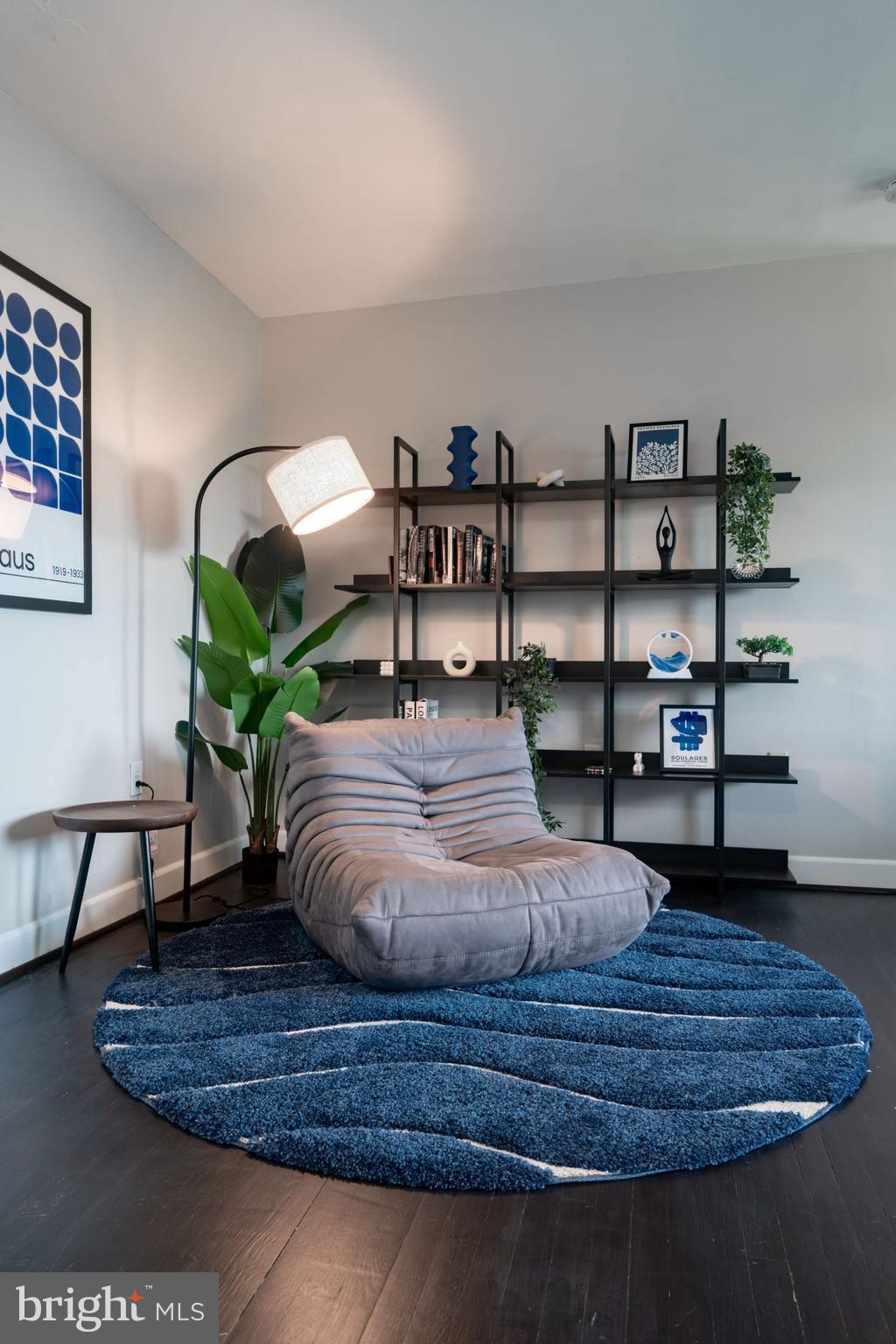 1300 South Arlington Ridge Road, Unit 705 Arlington, VA 22202 - Photo 3 of 25 a living room with furniture and wooden floor