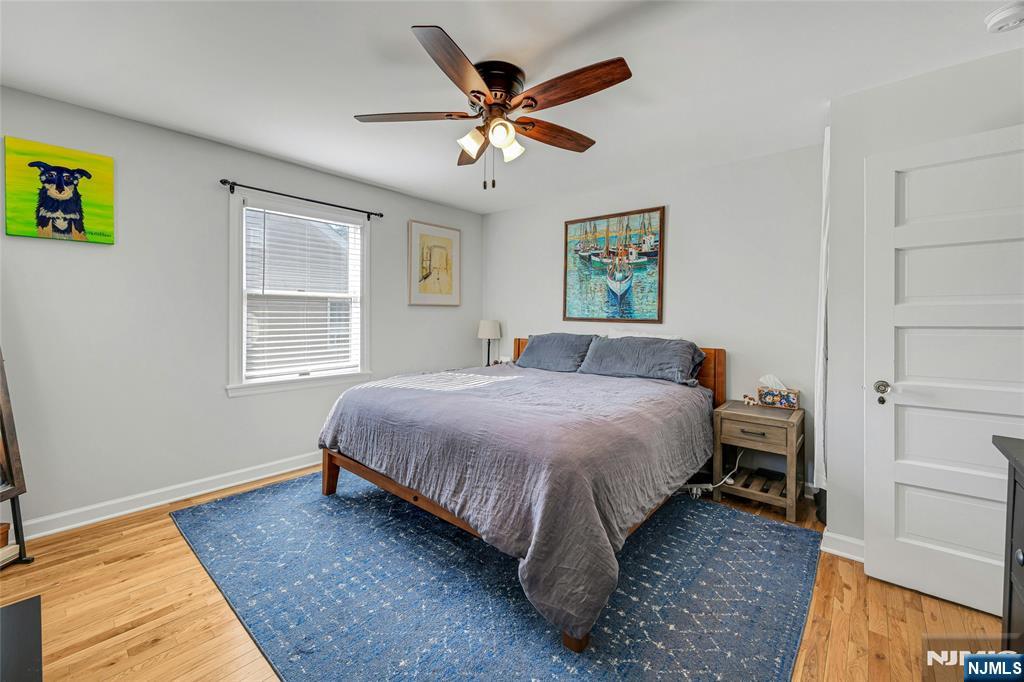 66 Smull Avenue Caldwell, NJ 07006 - Photo 18 of 32 a spacious bedroom with a bed and a window