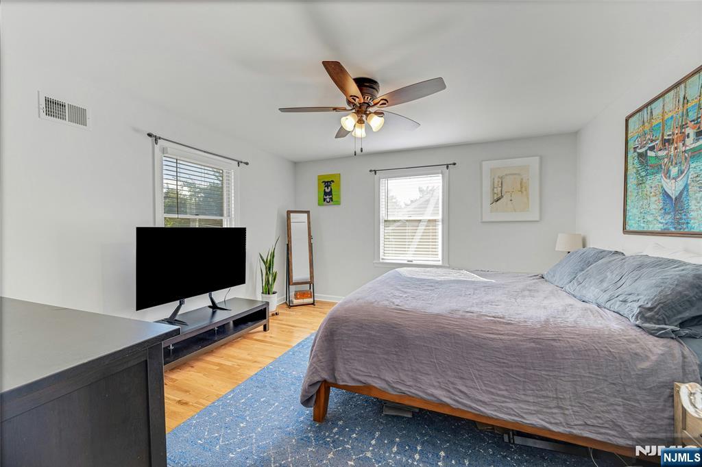 66 Smull Avenue Caldwell, NJ 07006 - Photo 19 of 32 a bedroom with bed tv and window