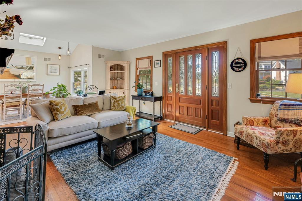 66 Smull Avenue Caldwell, NJ 07006 - Photo 5 of 32 a living room with furniture and a rug