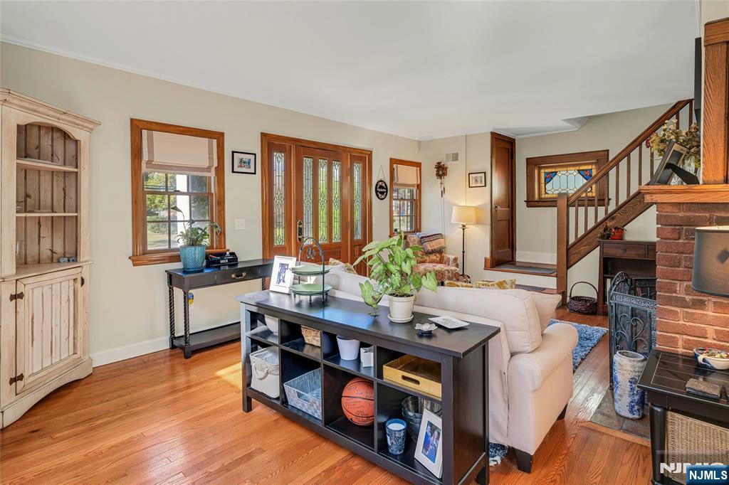 66 Smull Avenue Caldwell, NJ 07006 - Photo 6 of 32 a living room with furniture and a wooden floor