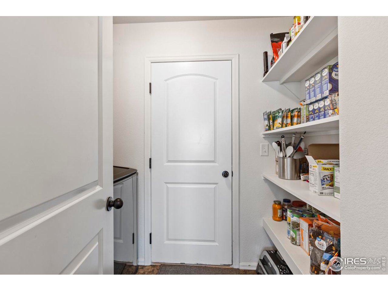 1010 Axis Drive Severance, CO 80550 - Photo 13 of 33 a view of hallway with cabinet