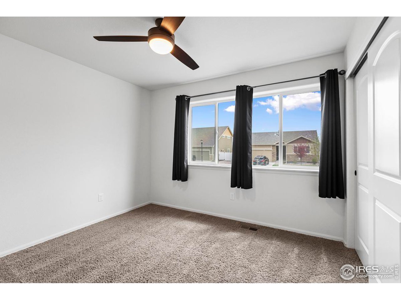 1010 Axis Drive Severance, CO 80550 - Photo 21 of 33 a view of an empty room with a window