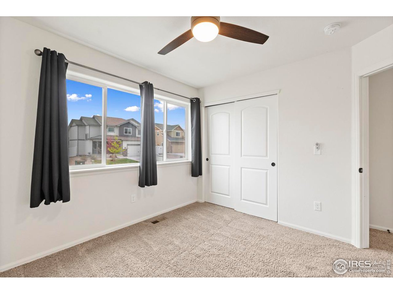 1010 Axis Drive Severance, CO 80550 - Photo 22 of 33 a view of an empty room and window