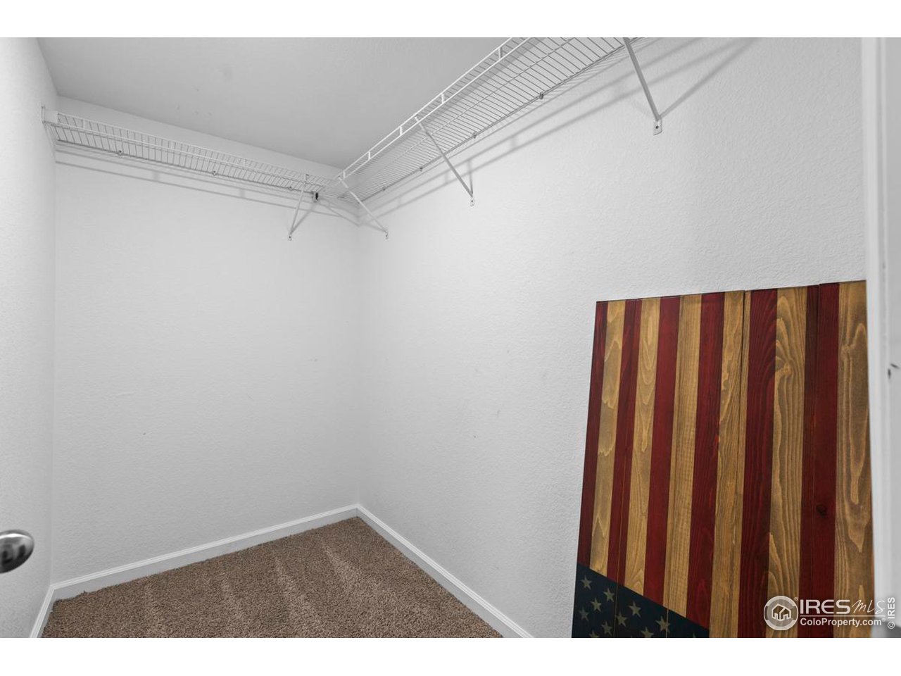 1010 Axis Drive Severance, CO 80550 - Photo 29 of 33 a view of a room with racks on the wall