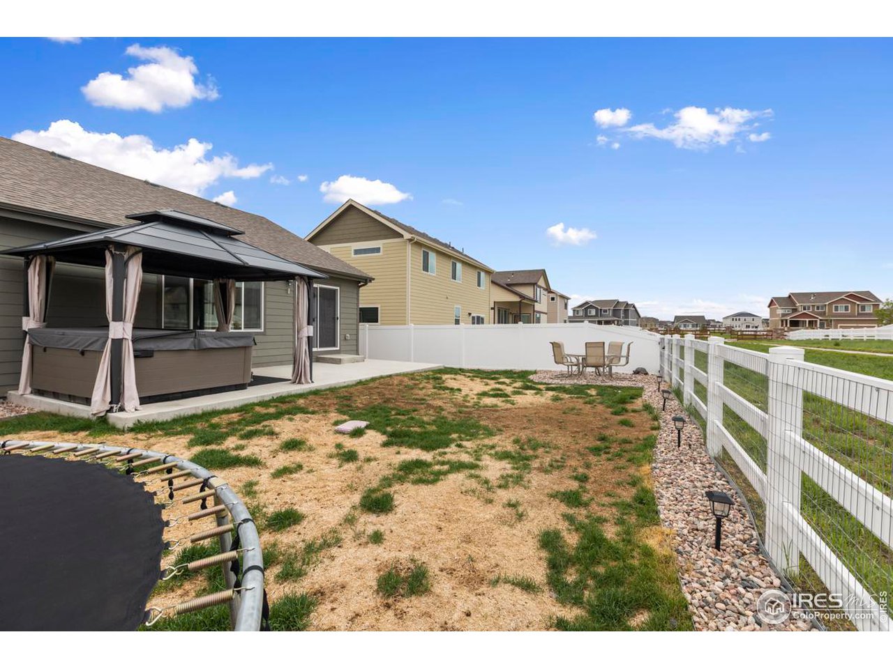 1010 Axis Drive Severance, CO 80550 - Photo 32 of 33 a view of a house with a yard