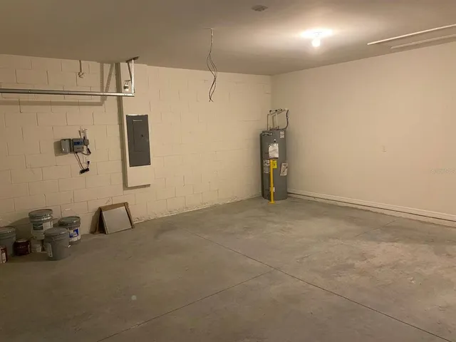 a view of a storage & utility room with two washing machine