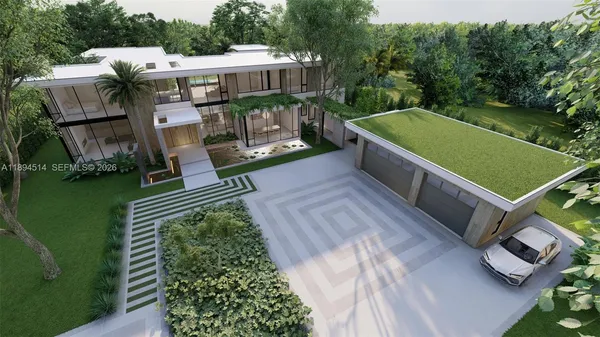 a view of a house with a yard