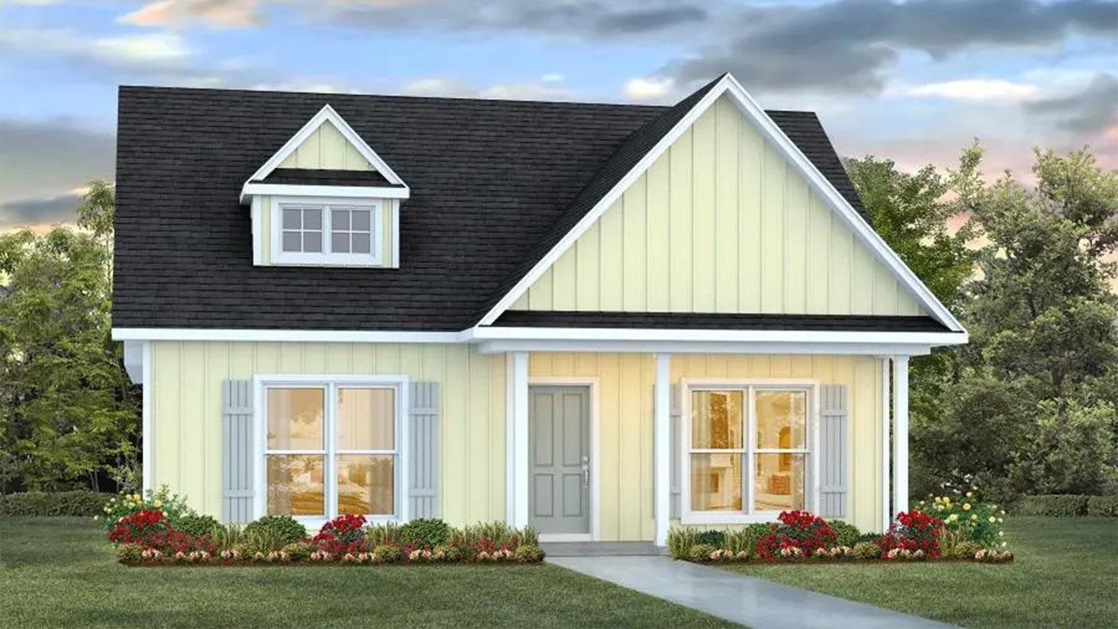 a front view of a house with a yard